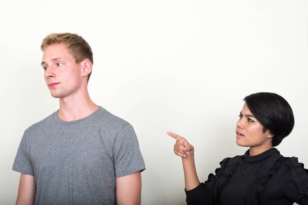 Portrait of young multi ethnic couple togetherの写真素材