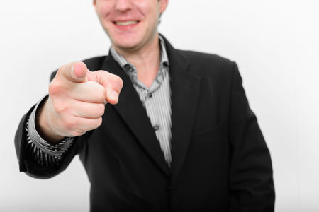 Studio shot of young handsome Scandinavian businessman against white background