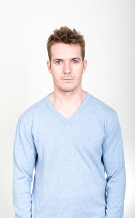 Portrait of handsome man looking at camera