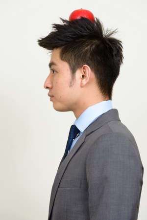Portrait of young handsome Asian businessmanの写真素材