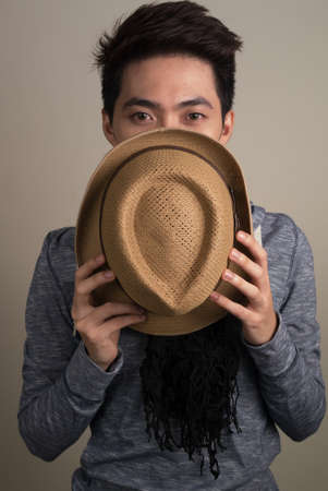 Portrait of young handsome Asian tourist manの写真素材