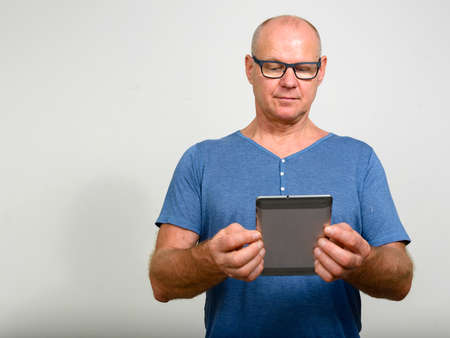 Portrait of mature handsome man with eyeglassesの写真素材