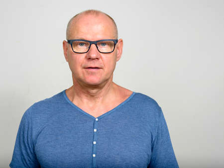 Portrait of mature handsome man with eyeglassesの写真素材