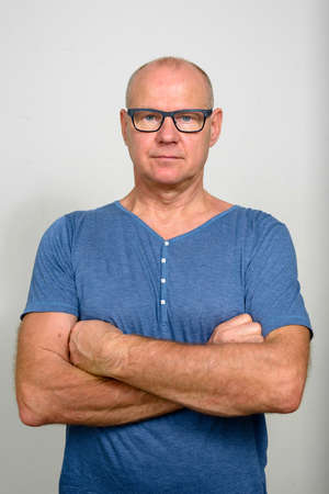 Portrait of mature handsome man with eyeglassesの写真素材