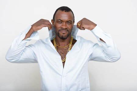Portrait of handsome bearded African man as gangster