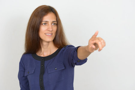 Portrait of young beautiful businesswoman with brown hair