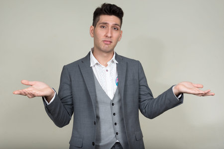 Portrait of young multi ethnic businessman in suit