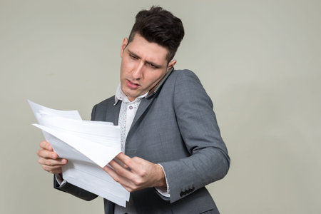 Portrait of young multi ethnic businessman in suit