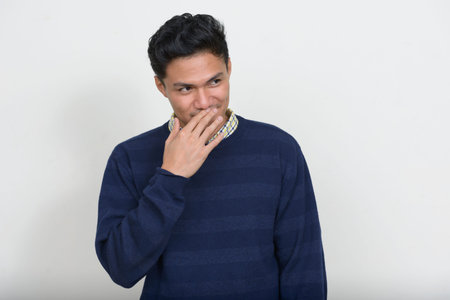 Portrait of handsome Asian man with sweater