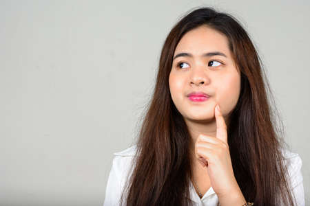 Portrait of young beautiful Asian teenage girlの写真素材