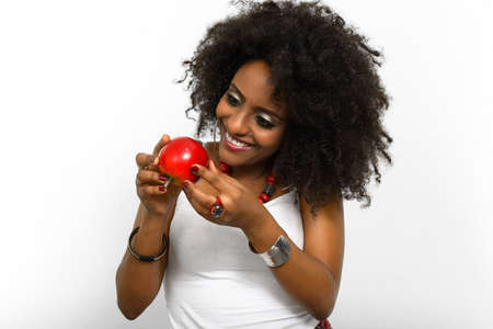 Portrait of young beautiful African woman with Afro hairの写真素材