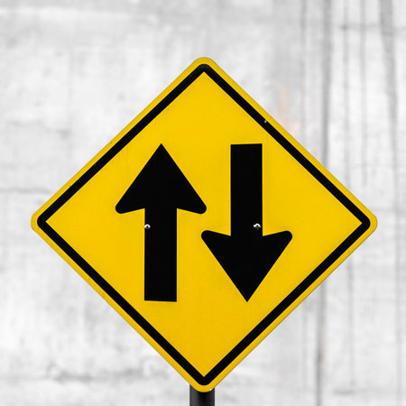 Portrait of two lane highway street sign outdoors