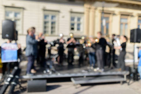 Small orchestra of musicans performing on the street in cityの写真素材