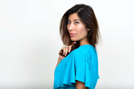 Portrait of young beautiful businesswoman looking at cameraの写真素材