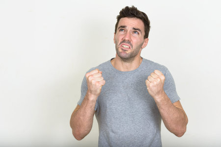 Portrait of handsome Hispanic man with beard stubbleの写真素材