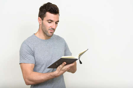 Portrait of handsome Hispanic man with beard stubbleの写真素材