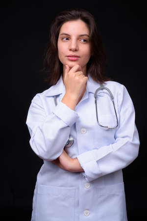 Portrait of young beautiful woman doctor with short hairの写真素材