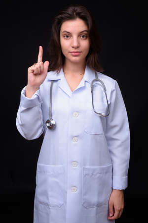 Portrait of young beautiful woman doctor with short hairの写真素材