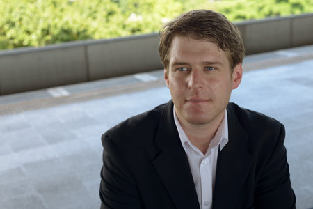 Portrait of young handsome businessman at the airport