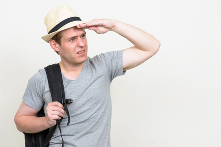 Portrait of young handsome tourist man ready for vacation