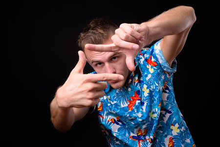 Portrait of young handsome tourist man ready for vacation
