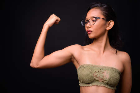 Portrait of young beautiful Asian woman in underwearの写真素材