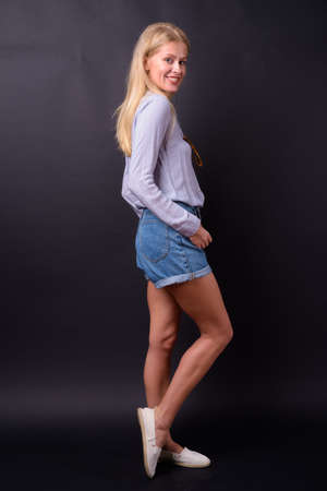 Portrait of happy beautiful woman with blond hairの写真素材