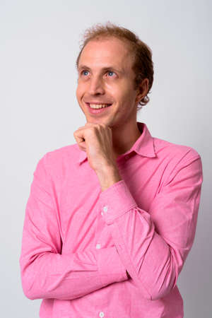 Portrait of happy businessman with blond hairの写真素材