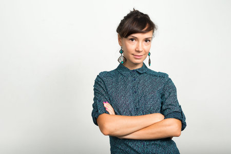 Portrait of beautiful businesswoman against white background