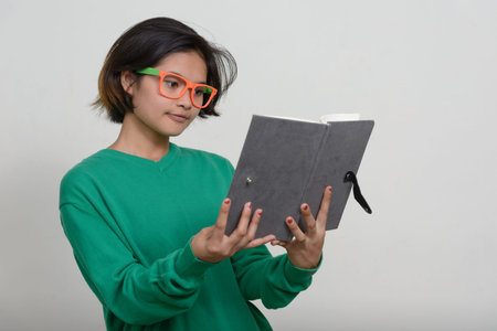 Portrait of young Asian teenage girl with short hair