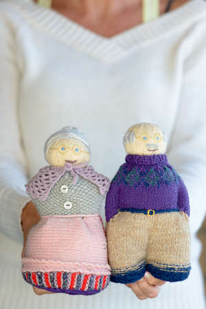 Portrait of knitted and handmade stuffed dollsの写真素材