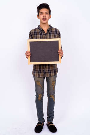 Portrait of young handsome Indian teenage boyの写真素材