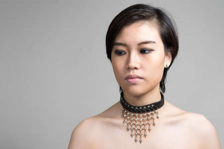 Portrait of young beautiful Asian woman with short hairの写真素材