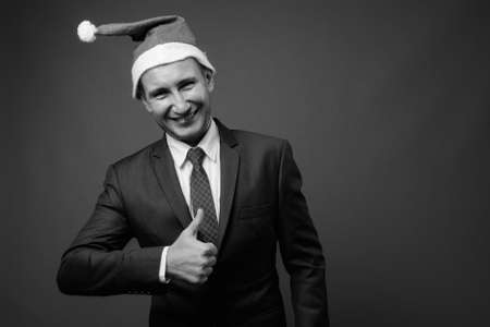 Portrait of businessman with Santa hat ready for Christmasの写真素材