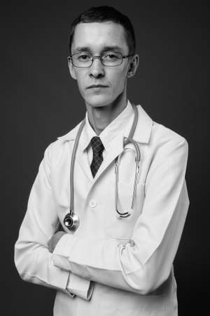 Portrait of young man doctor with eyeglassesの写真素材
