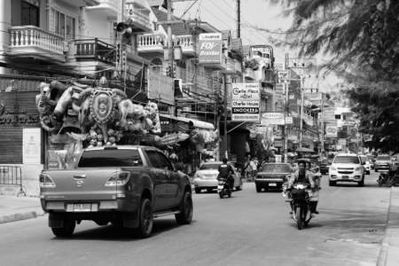 CHA-AM DISTRICT, THAILAND - FEBRUARY 24, 2017 - View of busy street with stores and hotels at the beachのeditorial素材