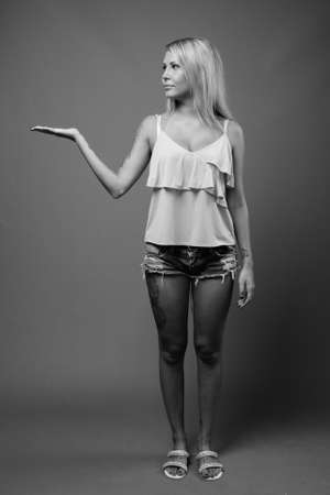 Portrait of young beautiful woman with blonde hairの写真素材