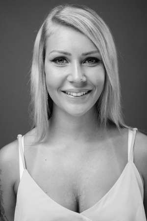 Portrait of young beautiful woman with blonde hairの写真素材