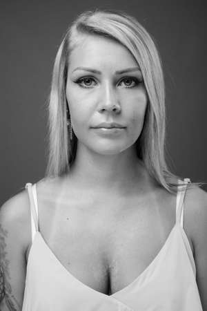 Portrait of young beautiful woman with blonde hairの写真素材