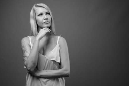 Portrait of young beautiful woman with blonde hairの写真素材