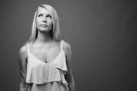 Portrait of young beautiful woman with blonde hairの写真素材