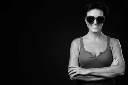 Portrait of happy mature beautiful woman with short hairの写真素材