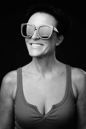 Portrait of happy mature beautiful woman with short hairの写真素材