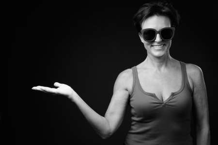 Portrait of happy mature beautiful woman with short hairの写真素材