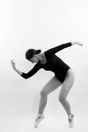 Full body shot of woman ballet dancer posingの写真素材