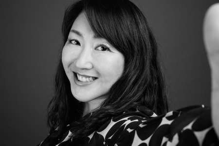 Portrait of happy mature beautiful Asian businesswomanの写真素材