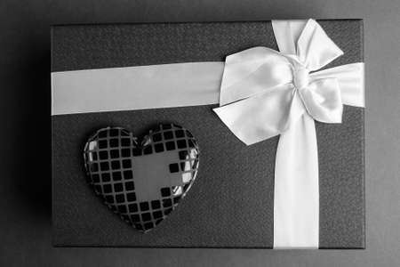 Studio Shot Of Gift Box Against Gray Backgroundの写真素材