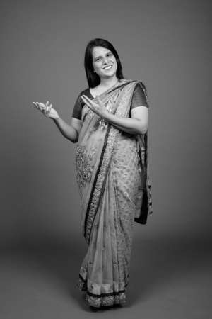 Mature Indian woman wearing Sari Indian traditional clothesの写真素材