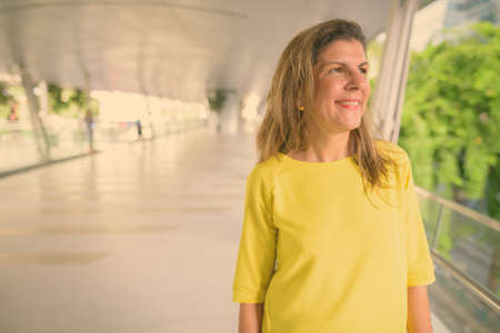 Mature tourist woman exploring the city of Bangkok, Thailandの写真素材