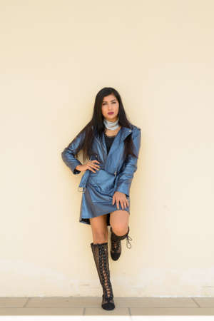 Full length shot of beautiful young woman standing outdoorsの写真素材